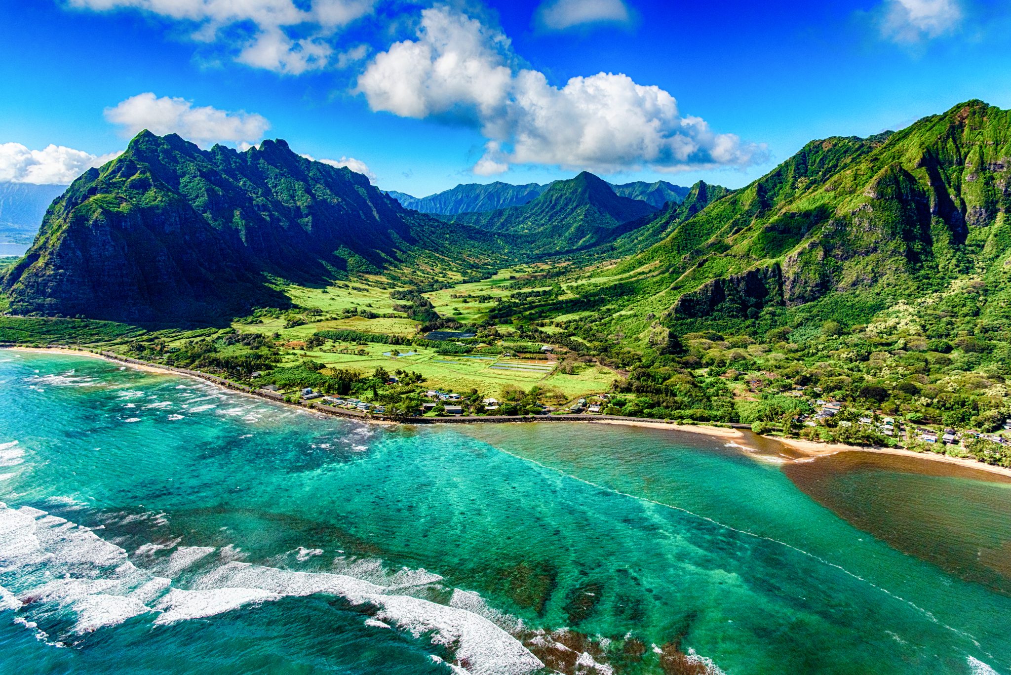 the-beautiful-and-unique-landscape-of-coastal-oahu-hawaii-and-the-kualoa-ranch-where-jurassic-park-was-filmed-as-shot-from-an-altitude-of-about-1000-feet-over-the-pacific-ocean-stockpack-istock